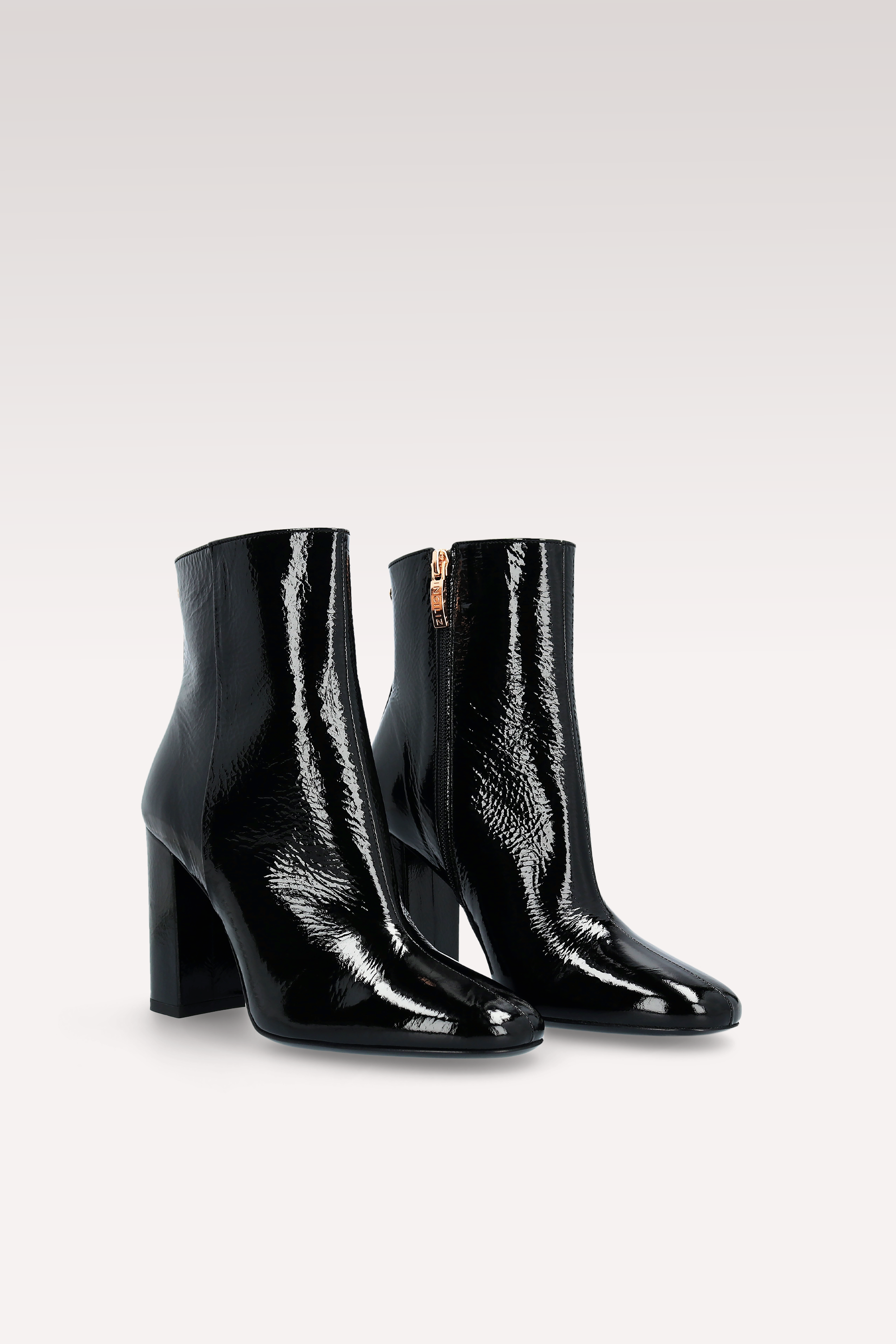 STIVALETTI IN VERNICE SCHIACCIATA NERA DELMA ZIP 02