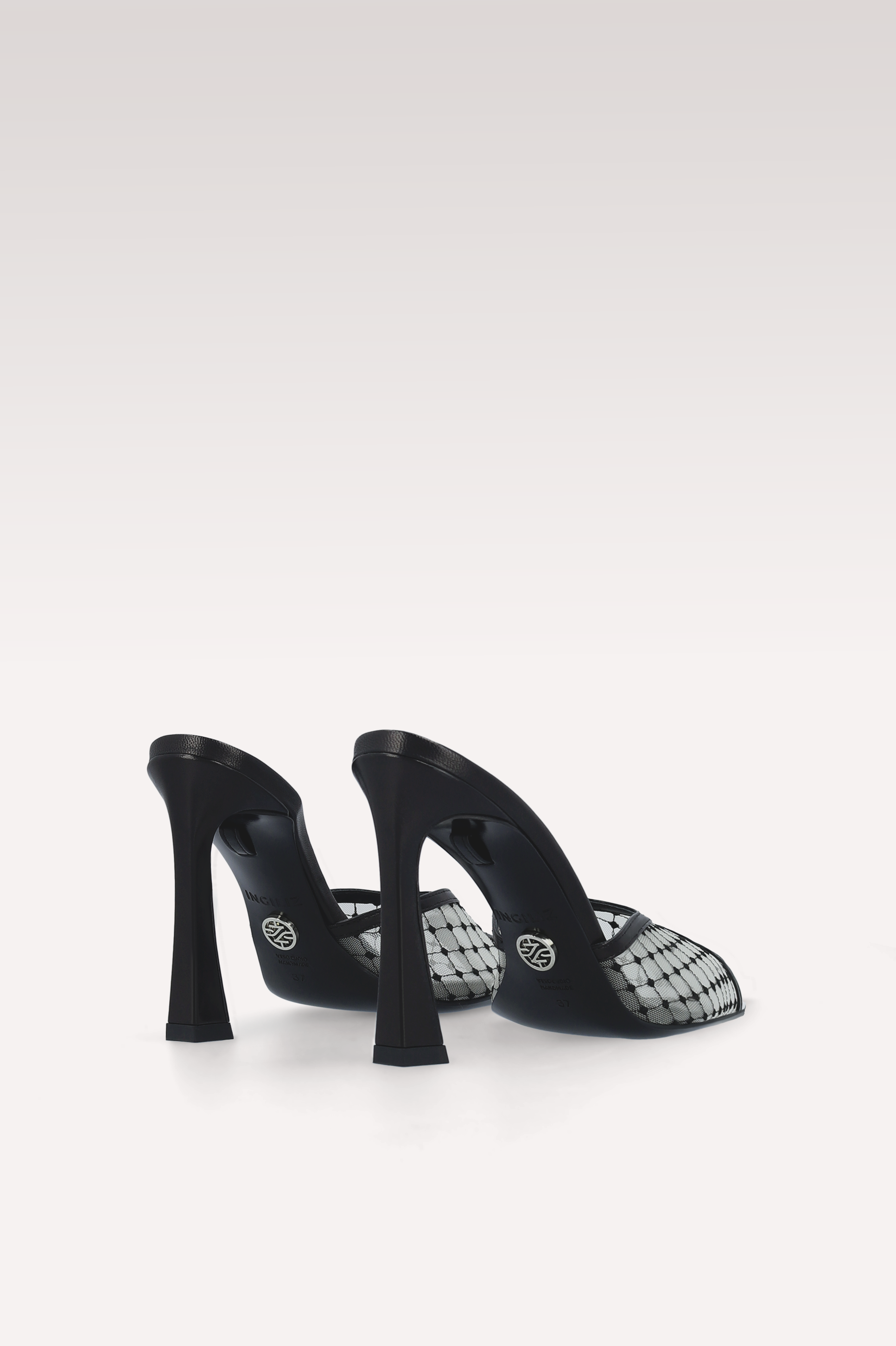 VELLORA BLACK AND WHITE LEATHER AND MESH MULES