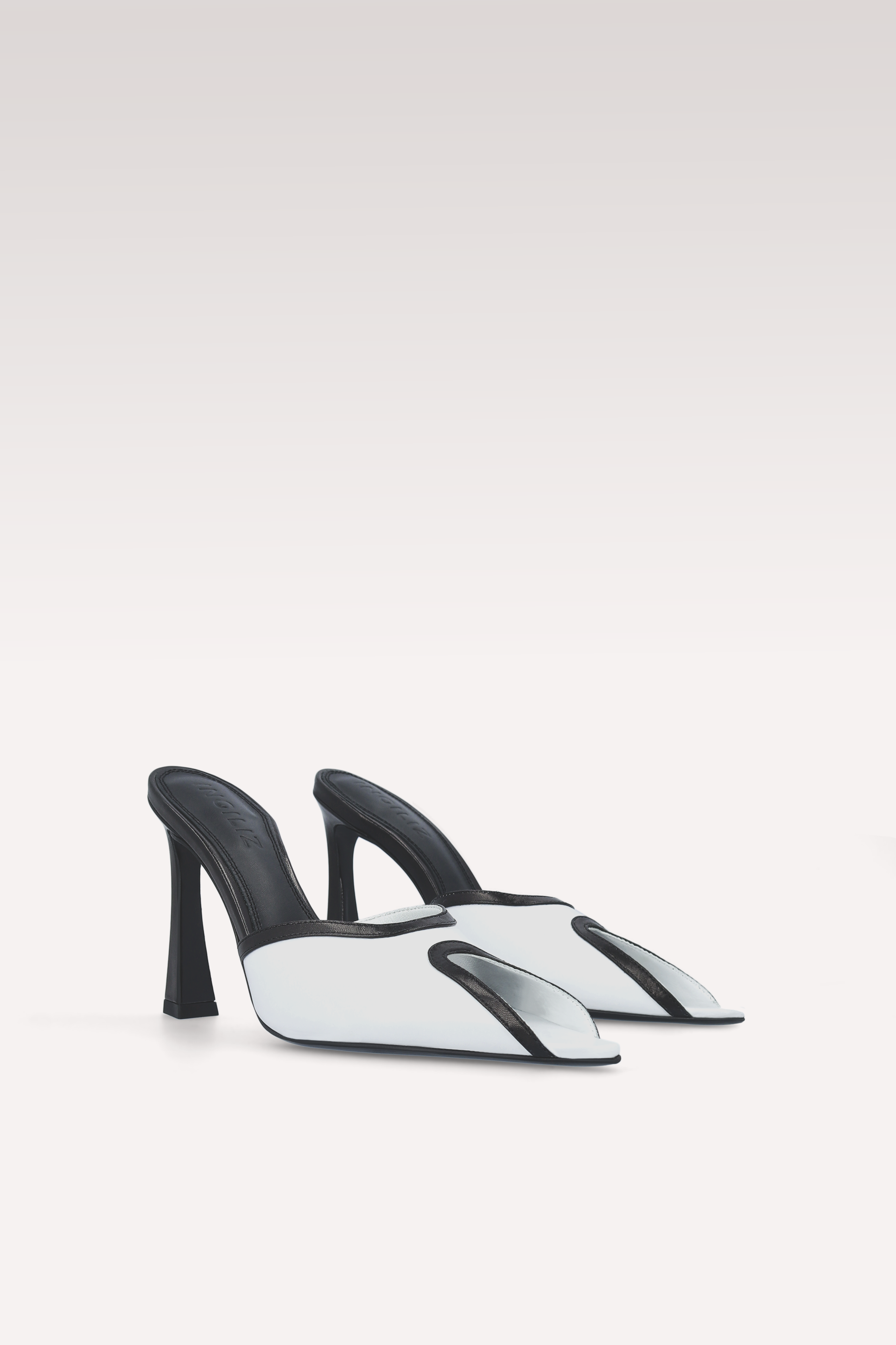 MULES VELLORA IN PELLE BIANCA E NERA