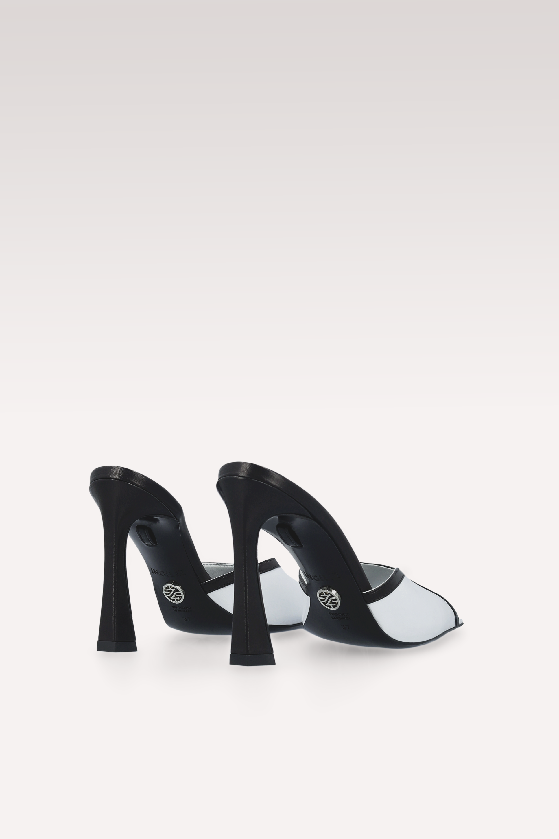 MULES VELLORA IN PELLE BIANCA E NERA