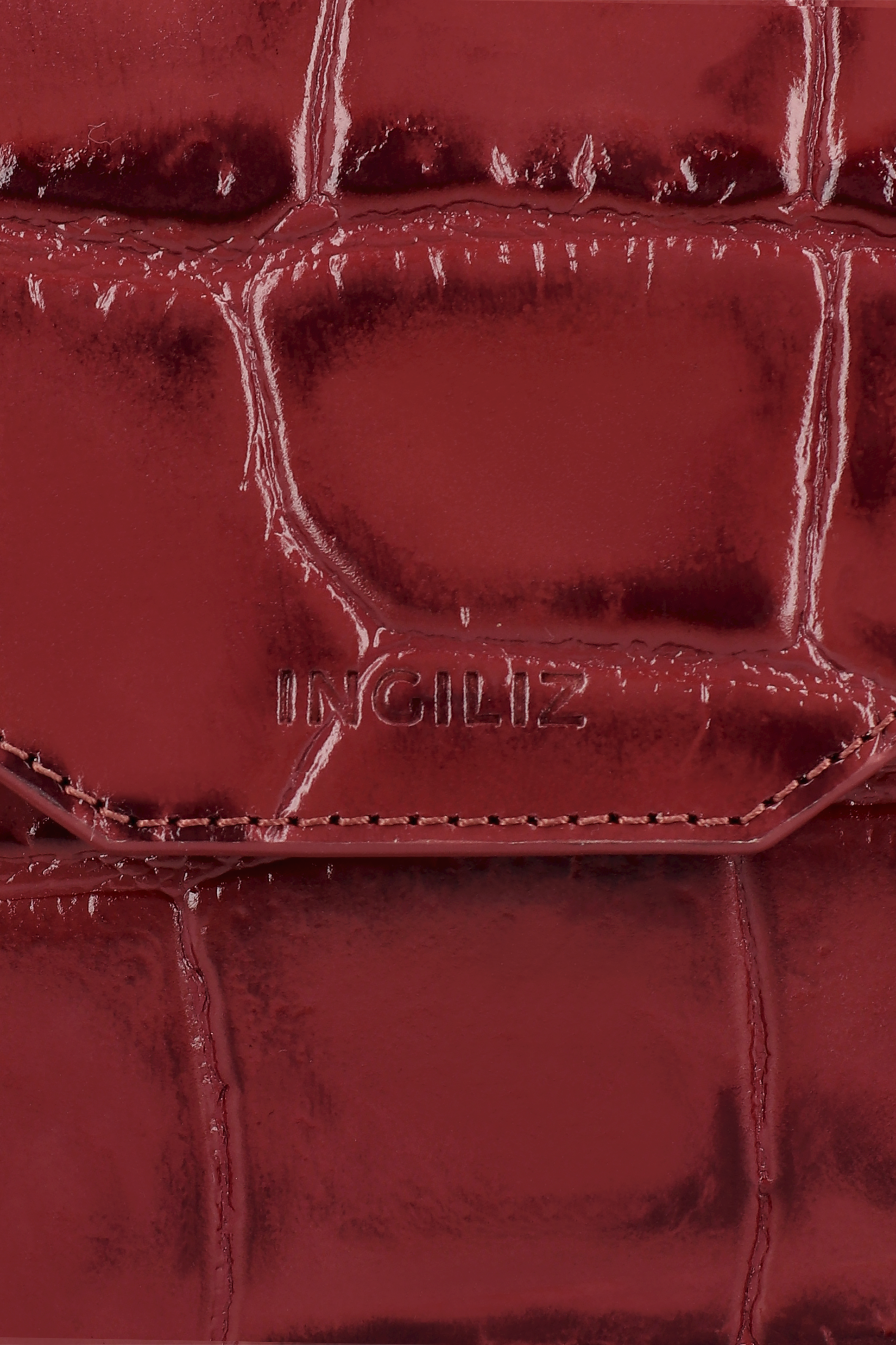 STIVALI IN PELLE STAMPATA COCCO DI NATALIE CHERY E MINI BORSA MILLY