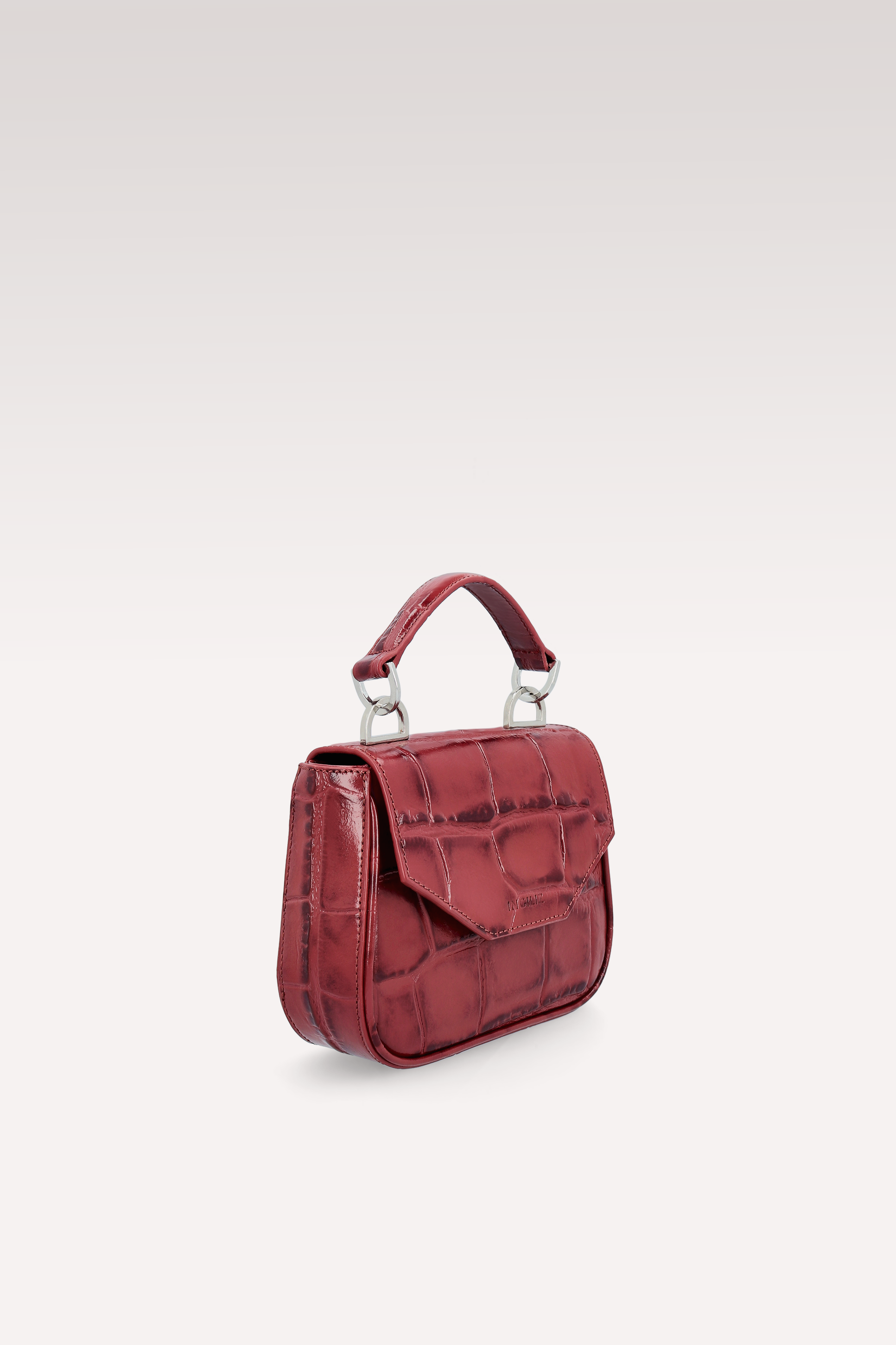 STIVALI IN PELLE STAMPATA COCCO DI NATALIE CHERY E MINI BORSA MILLY